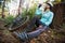 Female mountain biker drinking water