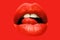 Female mouth isolated with red lipstick and tongue licking lips. Lick lip tongue, isolated on red. Tongue in the mouth