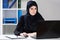 Female muslim during job