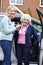 Female Neighbor Giving Senior Woman A Lift In Car