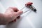 Female Neurologist working with Buck and Tylor reflex hammer for examination