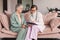 Female nurse doctor caretaker assisting happy senior grandma healthcare homecare concept