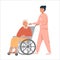 Female nurse with old woman on wheelchair. Grandmother sitting on wheelchair. Retired elderly senior woman disabled