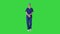 Female nurse standing and smiling to camera on a Green Screen, Chroma Key.