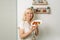 A female nutritionist holds sandwiches with adjika in her hands