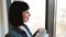 Female office worker relaxing during coffee break