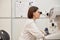 Female Ophthalmologist Using Vision Test Equipment