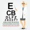 Female optician pointing to snellen chart