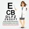 Female optician pointing to snellen chart