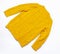 Female orange knitted sweater and autumn leaves on white background top view flat lay. Fashion Lady Clothes Set Trendy Cozy Knit J