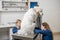 Female owner hugs and calm a big white sheepdog