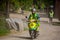 Female paramedics driving a motor scooter.