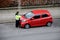 FEMALE PARKING INSPECTOR CHECKING PARKING PERMISSION