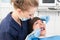 Female patient at dentist office having teeth examination