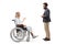 Female patient in a wheelchair talking to a bearded man