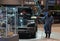 Female person dusting a RAM pickup truck at the Chicago Auto Show