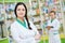 Female pharmaceutical worker portrait in drugstore