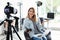 Female photo blogger recording video