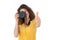Female photographer gesturing thumbs up