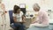 Female Physiotherapist Examining Senior Female Patient