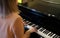 Female pianist plays the piano