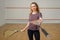 Female player gives squash racket