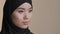 Female portrait islamic woman wear black hijab oriental girl in mourning widow muslim lady in head scarf looking into