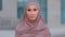 Female portrait outdoors close up islamic girl muslim young adult woman ethnic lady wearing beige hijab traditional