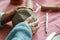 Female pottery artist preparing clay for molding. Close Up view of woman hands with clay. Creative handmade craft