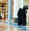 Female Prayer Rooms. Arab women in shopping market in Dubai