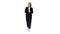 Female presenter blond woman walking and pointing to the sides on white background.