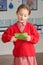 Female Primary School Pupil Cutting Shapes