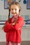 Female Primary School Pupil Standing