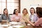 Female professional business team working in office