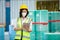 Female professional worker use tablet checking stock product in warehouse logistic storage. woman employee checklist package