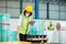 Female professional worker use tablet checking stock product in warehouse logistic storage. woman employee checklist package