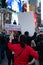 Female Protestor Holding a Sign at Times Square in New York City during a Myanmar Protest against the Military Coup