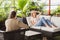 A female psychologists therapy session with a client indoors, sitting on the sofa