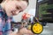 Female Pupil Building Robotic Car In Science Lesson