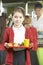 Female Pupil With Healthy Lunch In School Cafeteria