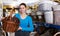 female purchaser standing with picnic basket