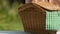 Female putting picnic basket on table closeup, open air meal for family weekend