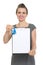 Female realtor holding blank clipboard and keys