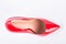 Female red shoe, top view.