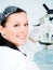 Female researcher holding glass tube