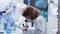 Female researcher taking notes in a clipboard