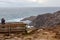 Female Retiree Taking Photos Of Australian Blowhole