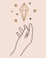 The female right hand holds a magic crystal. The mysterious stone sparkles, soars. Boho symbol for esoteric sessions, spiritual