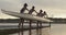 Female rowing team training on a river