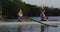 Female rowing team training on a river